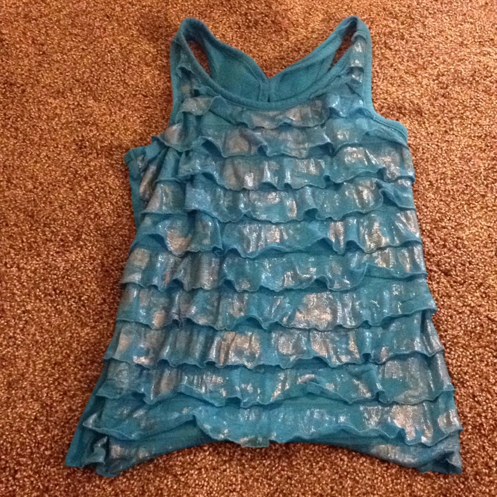 Blue ruffle girls tank top with a bow in the back.